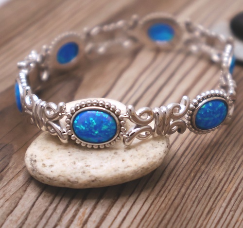 Stříbrný náramek s modrým syntetickým opálem Stříbrný náramek s modrým syntetickým opálem 1